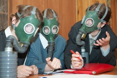 Businessmans in a gas mask clipart