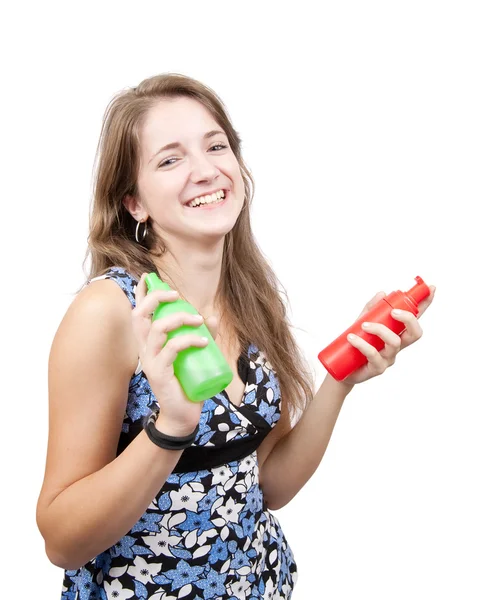 Long-haired girl with toilletries — Stock Photo, Image