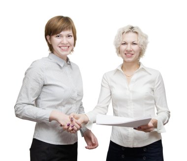 Two happy businesswomans handshaking clipart