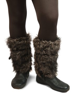 Woman feet in fur wintry boots clipart