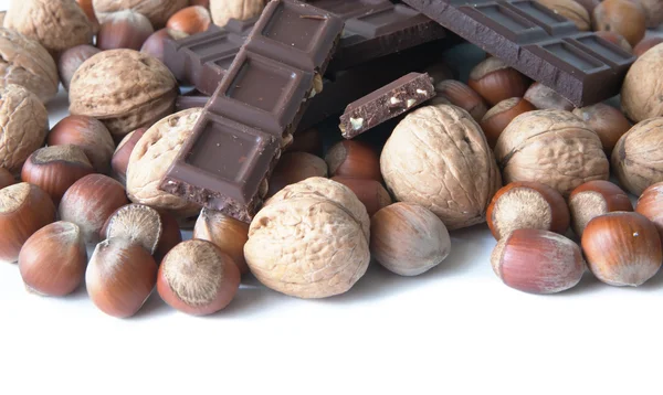 Nuts and chocolate — Stock Photo, Image