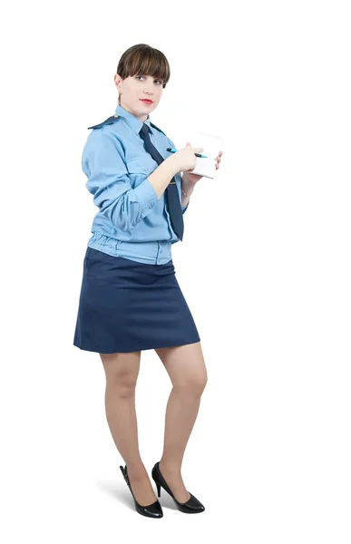 Frau in Uniform zeigt auf Blanko — Stockfoto