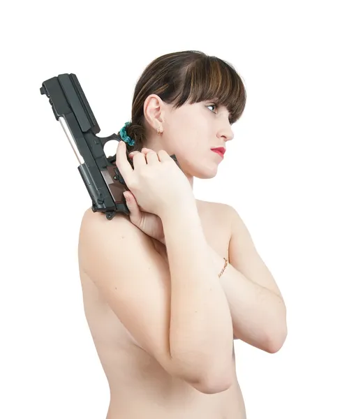 Сексуальная голая девушка с пистолетом — стоковое фото