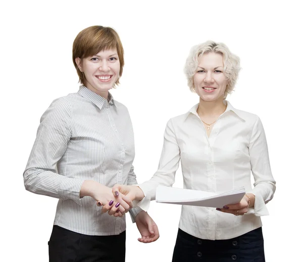 Dos mujeres de negocios felices apretando las manos — Foto de Stock