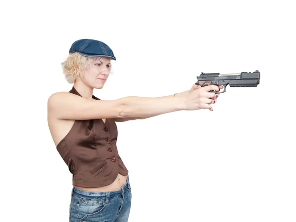 Chica apuntando un arma negra — Foto de Stock