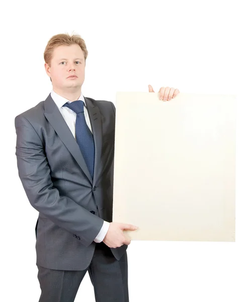 Homem de negócios segura tela em branco — Fotografia de Stock