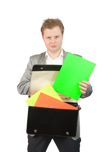Businessman putting papers — Stock Photo, Image