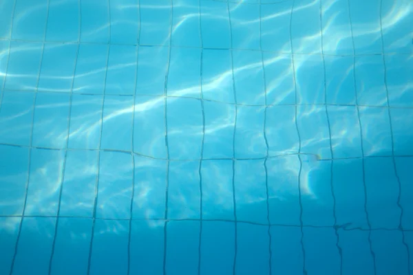Achtergrond van het water in het zwembad — Stockfoto
