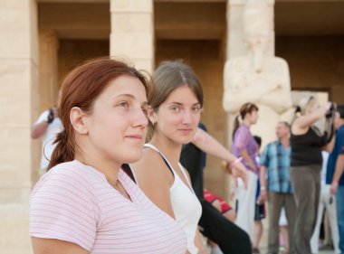 Tourists against Temple of Hatshepsut clipart