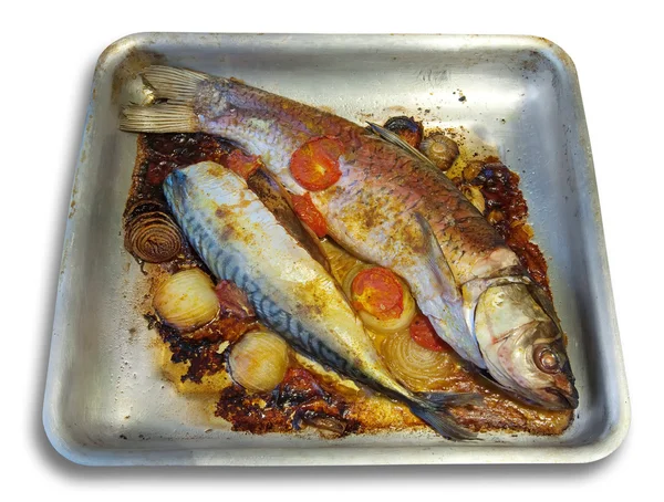 Fried fish on griddle, isolated — Stock Photo, Image