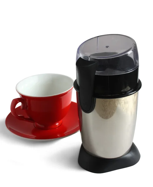 Electric coffee grinder and red cup — Stock Photo, Image