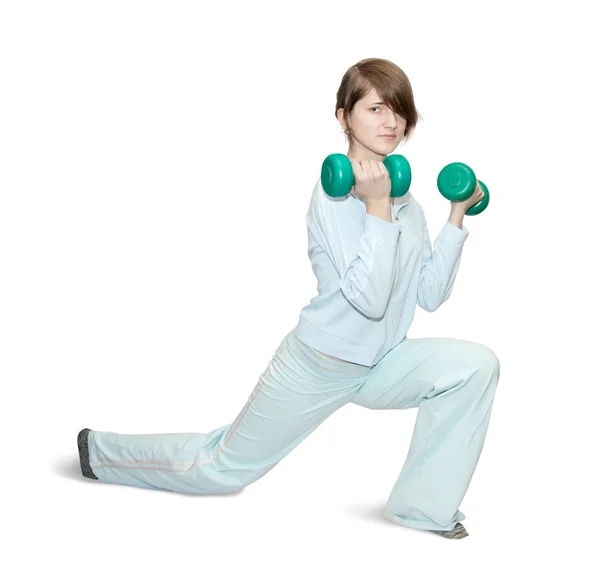 Menina está fazendo exercícios de fitness — Fotografia de Stock