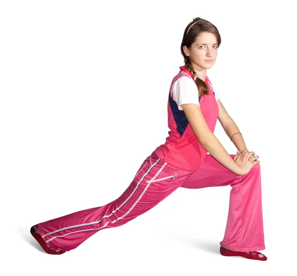 Flicka i rosa activewear gör fitness — Stockfoto