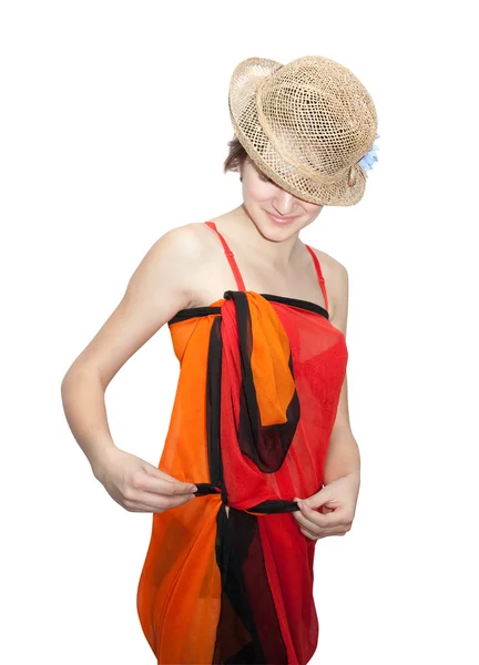 Flicka sträng en sarong — Stockfoto