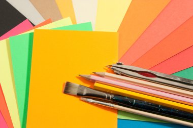 Stationery on colored papers clipart