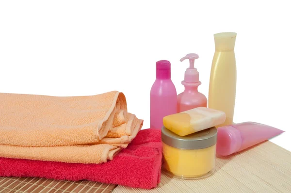 Toiletries with pink towel — Stock Photo, Image