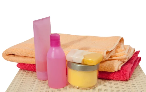 Toilletries with pink towel — Stock Photo, Image