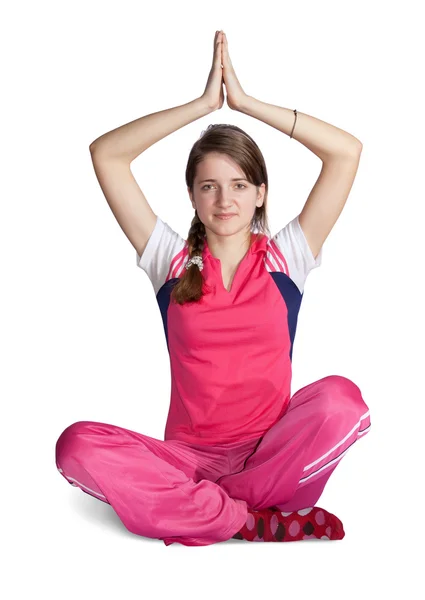 Mladá dívka dělá jógu — Stock fotografie