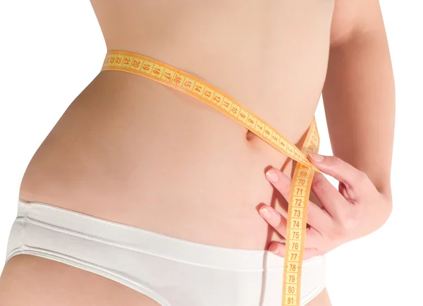 Mujer midiendo cintura — Foto de Stock