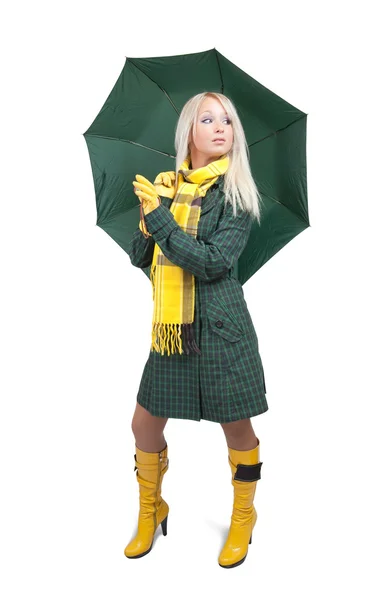 Dívka v zeleném kabátě s deštníkem — Stock fotografie