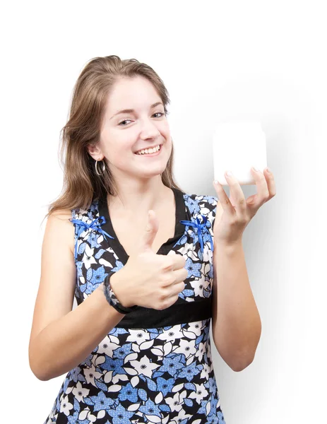 Meisje met witte cosmetische container — Stockfoto