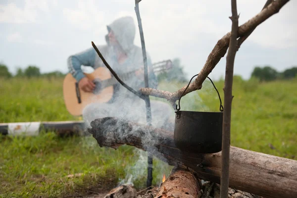 Ourists konvice na ohni — Stock fotografie