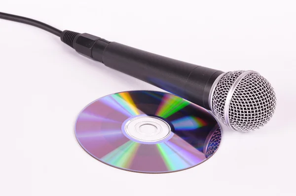 A microphone and compact disk is a disk — Stock Photo, Image