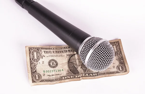 Microfone e dólar — Fotografia de Stock