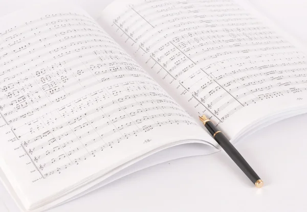 A zenei jegyzetfüzet toll — Stock Fotó