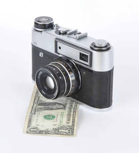 Стара камера і долар — стокове фото