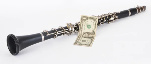 Clarinet and dollar — Stock Photo, Image