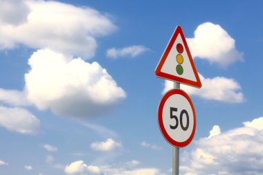 Traffic sign in the dark blue sky with c clipart