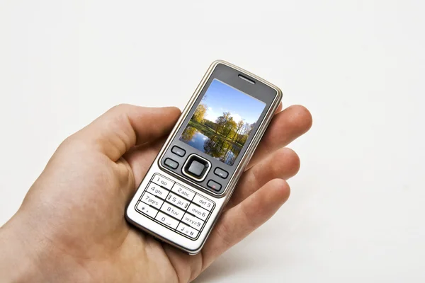 Handy auf einer Hand — Stockfoto