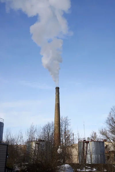 Smoke coming out of industrial chimney — Stock Photo, Image