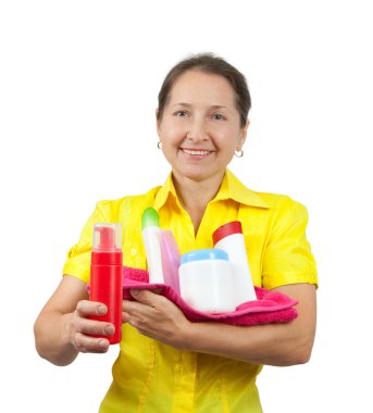 Women senior having hold of toiletries clipart