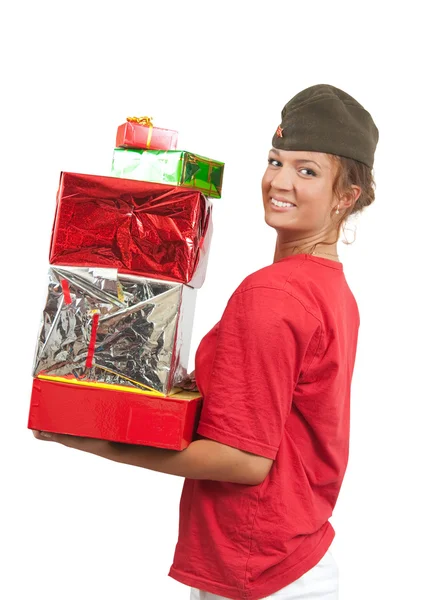Girl in garrison cap with christmas gift — Stock Photo, Image
