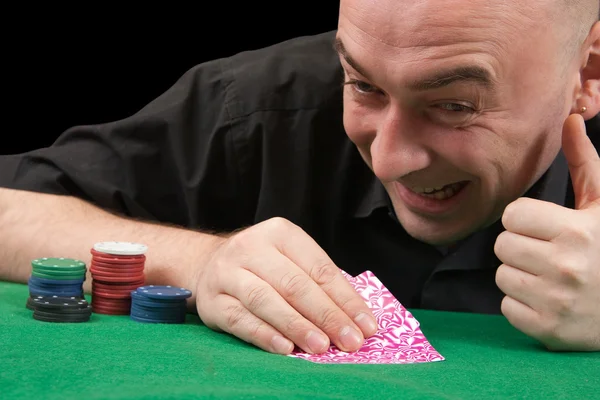 Dorosły człowiek, grając w pokera. na białym tle ov — Zdjęcie stockowe