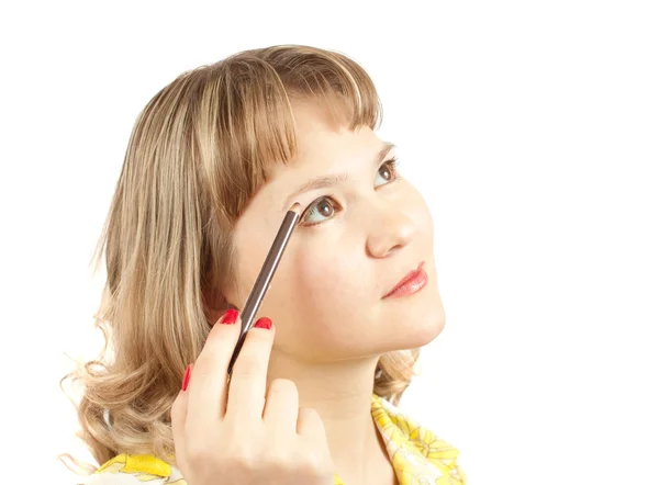 Menina cosméticos fazendo uma maquiagem — Fotografia de Stock
