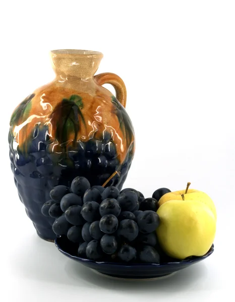 Decanter with fruits — Stock Photo, Image