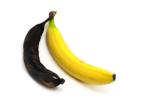 Together rotten and ripe bananas — Stock Photo, Image