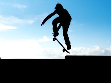 Skater in sky clipart