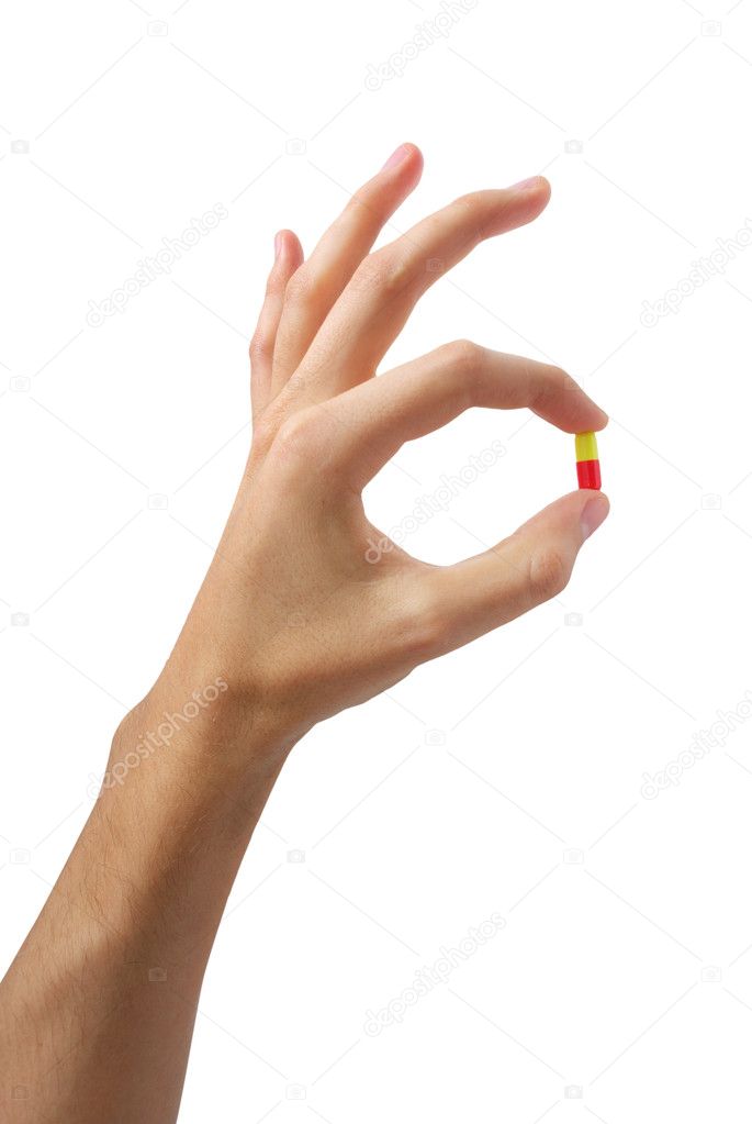 Hand with pill