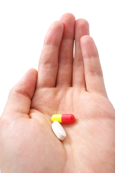 Hand and pills — Stock Photo, Image