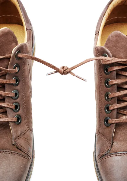 Paar zusammengeschnürte Schuhe — Stockfoto