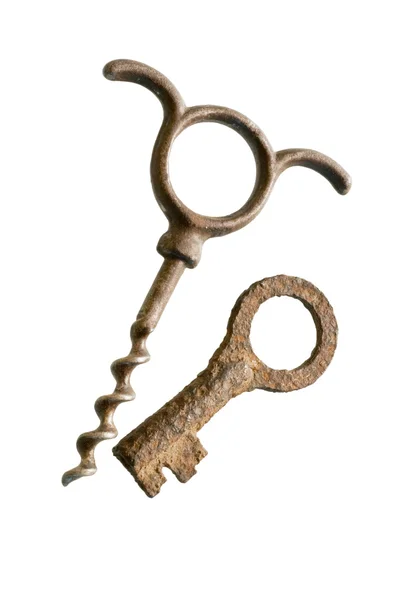 Corkscrew and rusty key — Stock Photo, Image