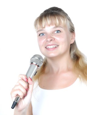 Woman singing into a microphone clipart