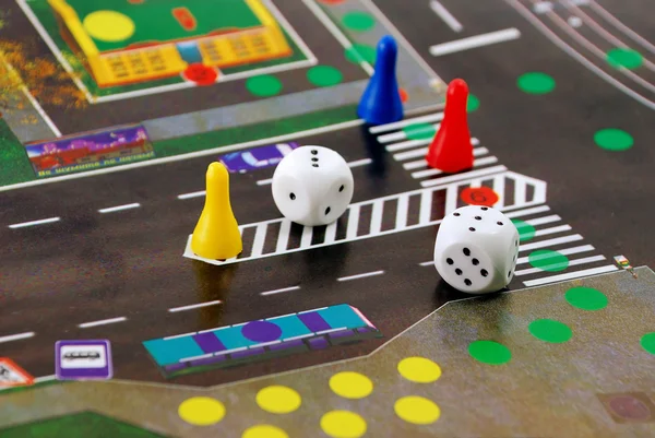 stock image Desk play road rules with chips and cube
