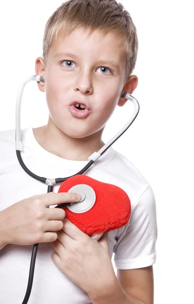 Sevimli genç çocuk oyun doktor — Stok fotoğraf
