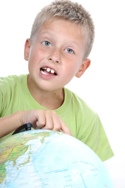 Schoolboy with earth globe — Stock Photo, Image