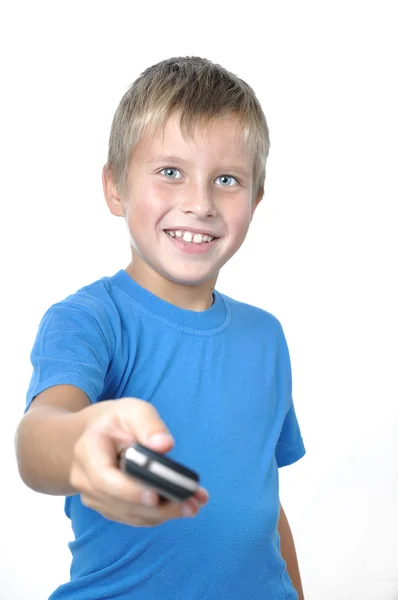 stock image Young man handing cellphone foward